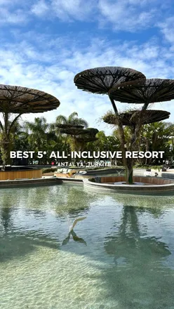 Luxurious all-inclusive resort in Antalya with diverse dining, pools, and family-friendly amenities.