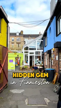 Colorful Hidden Lane in Finnieston, Glasgow with local shops, cafes like Rafa's Diner for tacos and Hidden Lane Tearoom for tea.
