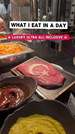 Delicious buffet spread at a luxury all-inclusive resort in Antalya, featuring doner and various gourmet dishes.