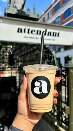 Iced pistachio latte at The Attendant, a quirky London coffee shop in a restored public toilet.