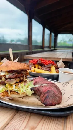Authentic BBQ shack at The Jungle NI near Moneymore, offering slow-cooked meats, steaks, smash burgers, and homemade chips.