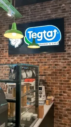 Tegtat Manchester's Turkish cafe offerings: baklava, San Sebastian cheesecake, Turkish tea, in Piccadilly Gardens.