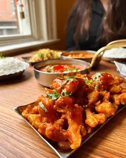Vegan and veggie Indian tapas at Viva Indian Tapas, Nottingham: Bang bang cauliflower, Punjabi Choley, samosa chaat, Paneer makhni, rice, mango lassi.