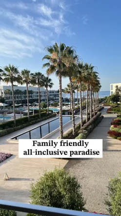 Family enjoying a deluxe suite at Ikos Andalusia, with beach views and themed dining options for all ages.