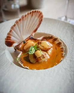 Inn at the Sticks pub in Llansteffan with seasonal small plates like seared scallops, pulled lamb, and Welsh beef pie.