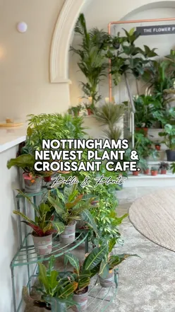 Delicious Nutella croissant and iced vanilla latte at Public & Plants, a vibrant Nottingham coffee shop.