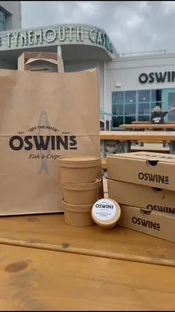 Delicious fish and chips from Oswins, a chippy by Tynemouth Beach, perfect for summer outings.