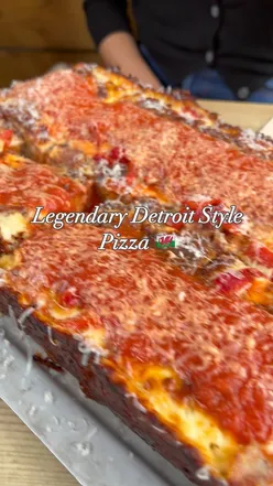 Detroit-style pizza with buttery crust, gooey cheese, and fresh toppings at Towpath Inn, Abergavenny. Hot honey dip included.