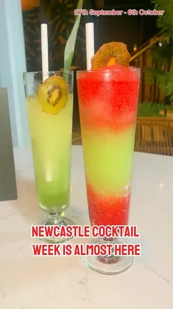 A vibrant cocktail bar scene showcasing delicious drinks and food during Newcastle Cocktail Week festivities.