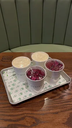 Shake Shack burger and milkshake at Oxford launch party, highlighting student life and UK food scene.