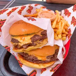 Insane smash burgers from Heavy Handed LA with perfect meat-to-bun ratio, top-notch sauce, and seasoned patties.