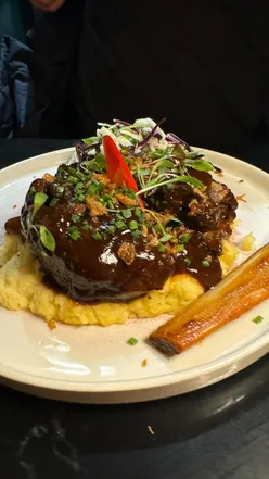 Delicious mocktails and gourmet dishes at The Nines in Derby, featuring beef rib, sea bass, and decadent desserts.