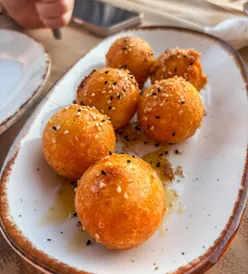 Foodie returns with Leicester restaurant exploration, inspired by local food pages, celebrating with Greek cuisine.