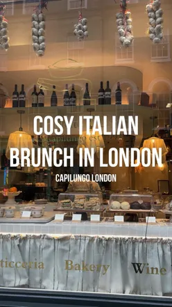 Cozy Italian brunch at Capilungo London near Covent Garden with basil shakshuka, sourdough, Parma ham, and creamy pistachio pie.