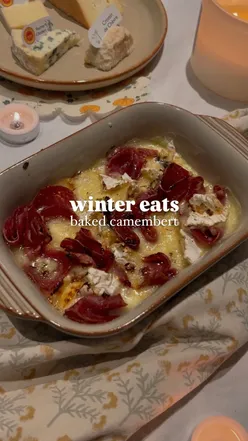 Baked Camembert with mixed herbs, chili oil, and honey in Denby Pottery dish, served with fresh baguette for winter date night.