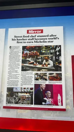 Hawker Chan Michelin-starred street food in Singapore's Chinatown, enjoyed by travelers after 28-hour journey.