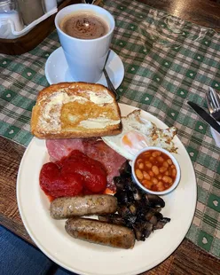 Cozy Causey Arch Tea Rooms breakfast with full English minus black pudding, pumpkin spiced coffee, and a dog-friendly vibe.