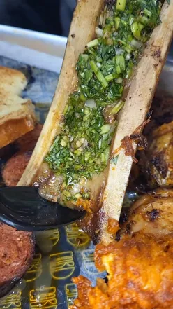 A variety of juicy meats from Side Street's new BBQ menu, featuring beef brisket and hoagies.
