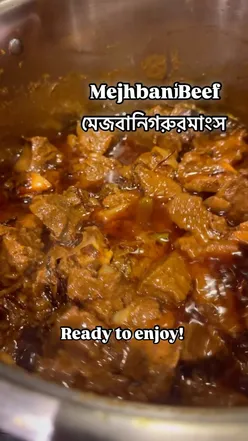 Authentic Mejbani Beef cooked in mustard oil, a traditional Chatgaiya dish from Chittagong, Bangladesh, served for a special occasion.