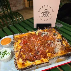 Detroit-style sweet pepperoni pizza with hot honey and garlic chive dip from Cutie Pies and Fries at Cambridge Street Collective, Sheffield.