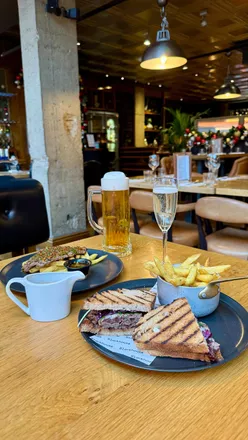 Blackhouse Leeds bottomless brunch: steak frites, steak sandwich with fries, frozen strawberry daiquiri, unlimited drinks.