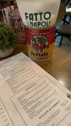 Delicious Italian pizza and drinks at Fatto a Napoli, featuring bruschetta, arancini, and gelato in Solihull.