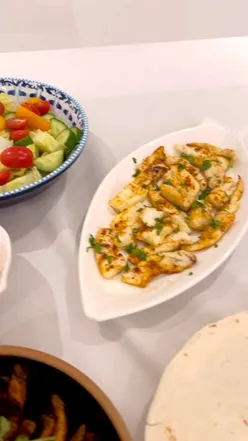 Delicious homemade fish tacos topped with fresh ingredients, perfect for Taco Tuesday or a tasty dinner.