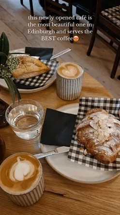 Chocolaty, nutty coffee in Edinburgh café with pastries; best coffee experience in cozy, aesthetic setting.