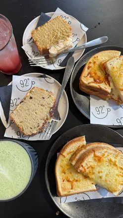 Coffee shop date with matcha latte, strawberry iced tea, ham & cheese toastie, chorizo toastie, chai loaf, banana bread.