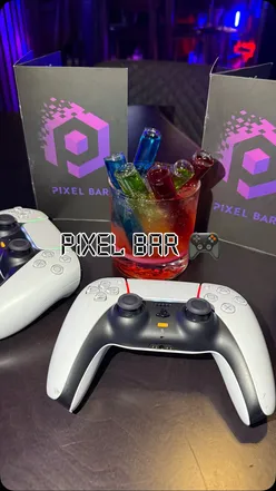 Themed cocktails and delicious food at Pixel Bar, perfect for gaming and a fun atmosphere in Liverpool.