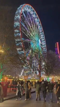 Festive Christmas market scene in Edinburgh, celebrating the holiday season and New Year 2025.