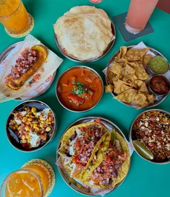 Indo-Mexican menu at Bundobust featuring Tofoo achari tacos and Paloma cocktail, launched June 2024.