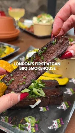 Vegan BBQ smokehouse in London Fields serving smoked tofu, ribs, and brisket with eco-friendly packaging.