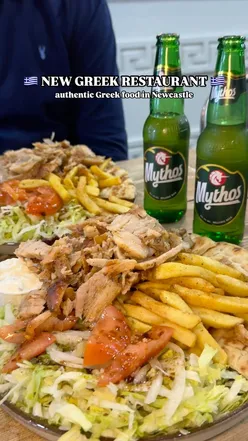 Delicious Mix Gyros Platter with chicken, pork, halloumi, tzatziki, and Mythos beer at new Greek restaurant in Newcastle.