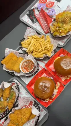 Delicious dessert spread at Big Licks Braehead: crepes, cookie dough, burgers, and loaded fries. Perfect for foodies in Glasgow.