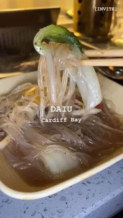 Korean BBQ and hotpot at DaiU Cardiff Bay with noodles, mushrooms, and veggies. Enjoy diverse Asian cuisine options.