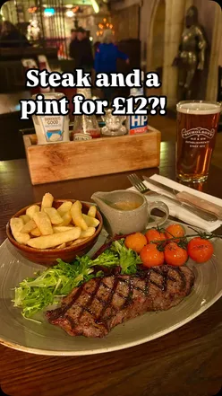 Sirloin steak with chips and sauce at The Bacchus Bar, Birmingham. Enjoy 50% off and a free pint with online signup.