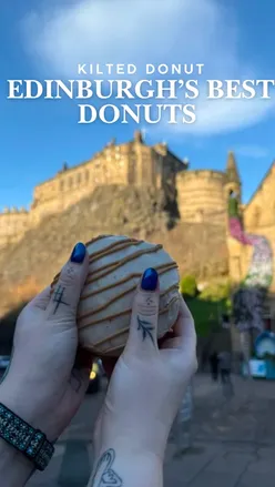 Assorted vegan donuts from Kilted Donut in Edinburgh, featuring a lemon drop and seasonal flavors, available on Deliveroo.