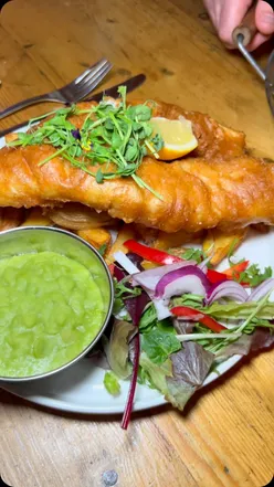 Scranny Dyer attempts fish and chip challenge at The New Punchbowl, featuring fish, sausage, scampi, patties, and chips.