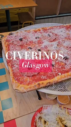 New Haven pizza slice with truffle fries at Civerinos in Glasgow, Scotland. Delicious food experience. #pizza #glasgowfood