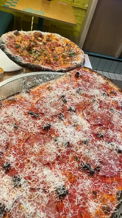 Newhaven style pizza with thin crispy base, 'Nduja, Salami, marinara, pecorino at Civerinos in Glasgow.