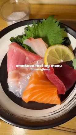 Omakase sushi menu at Gaijin Sushi UK with sashimi, nigiri, hand rolls, karaage, and miso soup. Fresh fish prepared live.