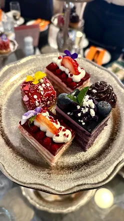Valentine's afternoon tea at The Nici with elegant cakes, scones, and prosecco, perfect for a romantic celebration.