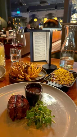 Fillet steak with hispi cabbage and blooming onion at Birmingham's new Cow & Sow steak restaurant.