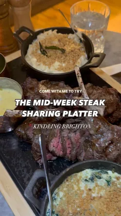 Mid-week steak platter with House Bavette, Sirloin, Lamb Chops, Mac & Cheese, and Creamed Spinach at Kindling Restaurant.