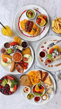 Brunch dishes at Brags & Brams: Brams Pancakes, Colombian Eggs, Newington Green, Mediterranean platter with diverse flavors.