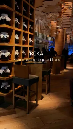 Delicious black cod and aubergine dishes at Roka restaurant, celebrating a birthday with Japanese cuisine.