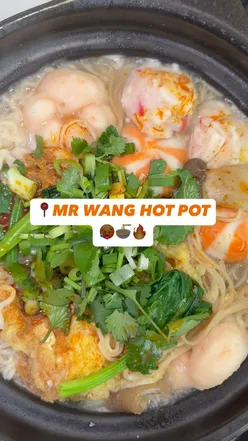 Seafood hot pot at Mr Wang Hot Pot in Leicester with shrimp, lobster, and oysters, prepared fresh with custom seasoning.