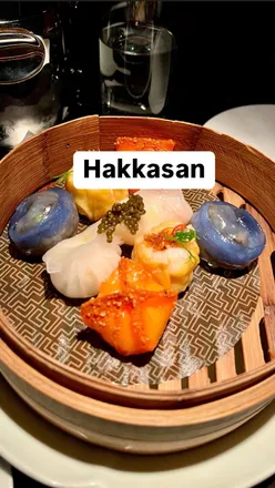 Cantonese feast at Hakkasan London: lobster dim sum, spicy prawns, soy cod, satay chicken, and a signature dessert.