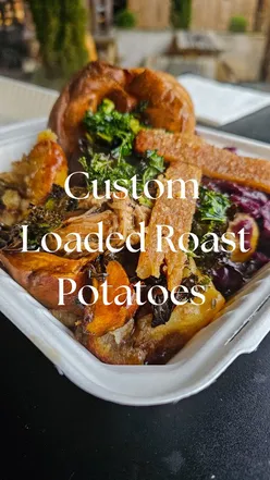 Crispy loaded roast potatoes with beef, pork, or nut roast balls at The Castle Green Pub, Old Market. Comfort food feast.